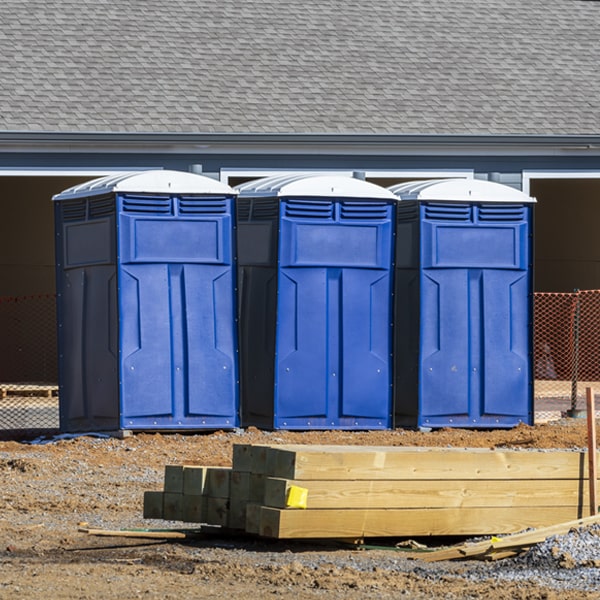 what is the cost difference between standard and deluxe portable toilet rentals in Mc Neill MS